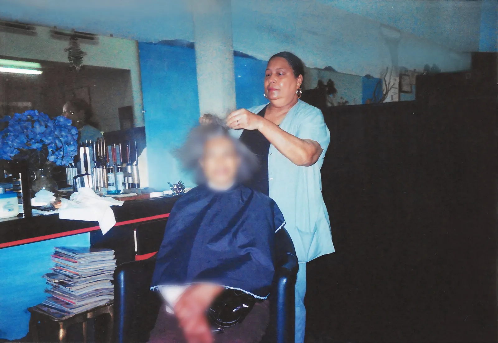 Lucretia Clark at work inside Renaissance Hair Salon at 5365 Crenshaw Boulevard
